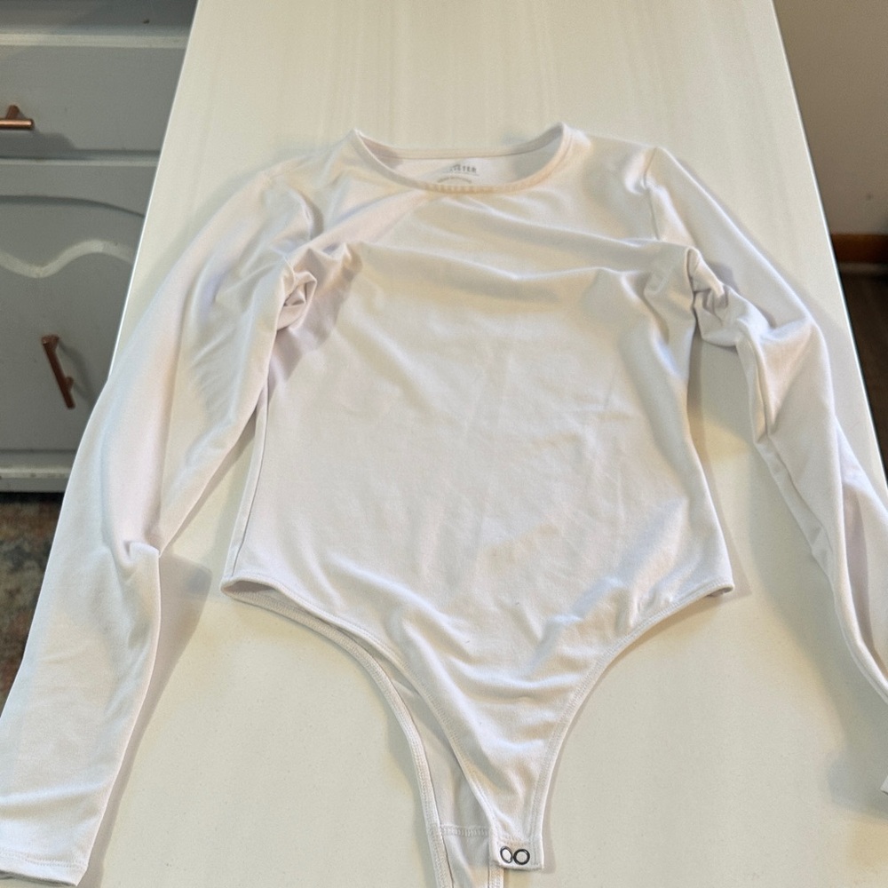 Long-Sleeve One-Piece Bodysuit in White - Hollister